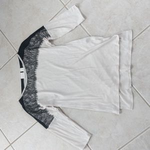 Women's size 0 tan and black top